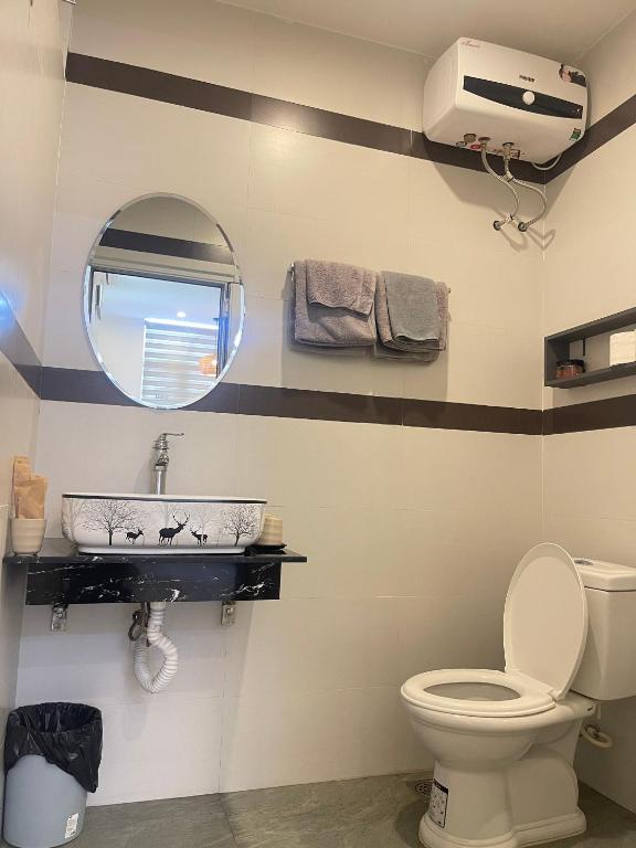 Koupelna v ubytování SAM HOMESTAY HUE
