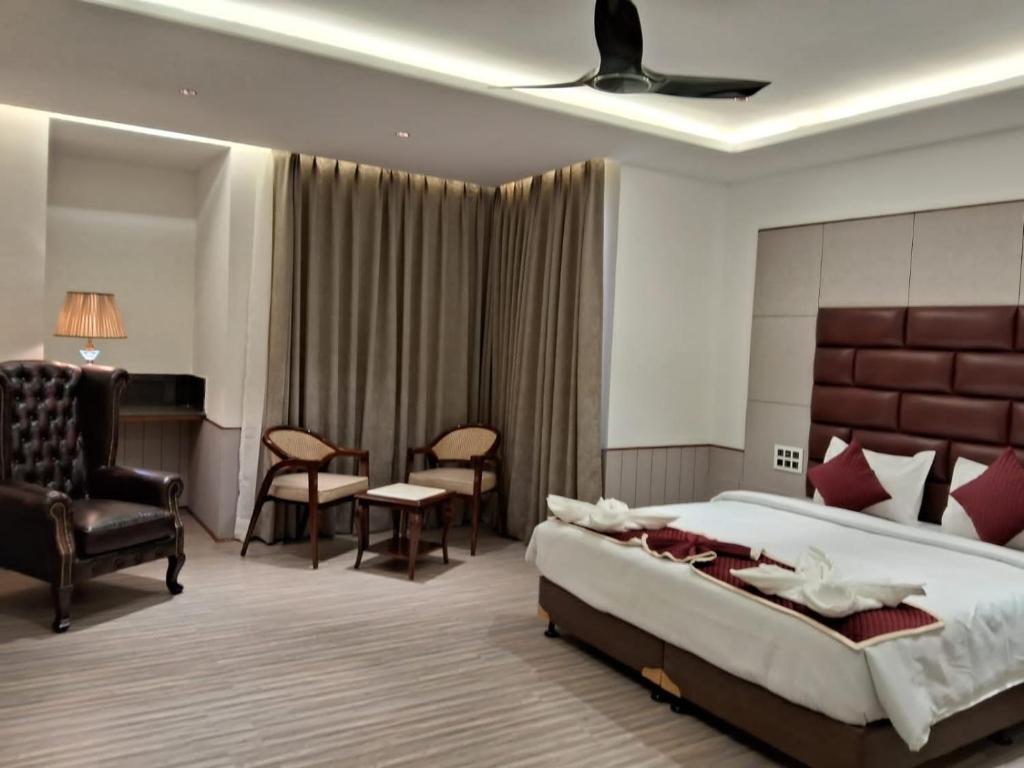 Postel nebo postele na pokoji v ubytování Hotel k11