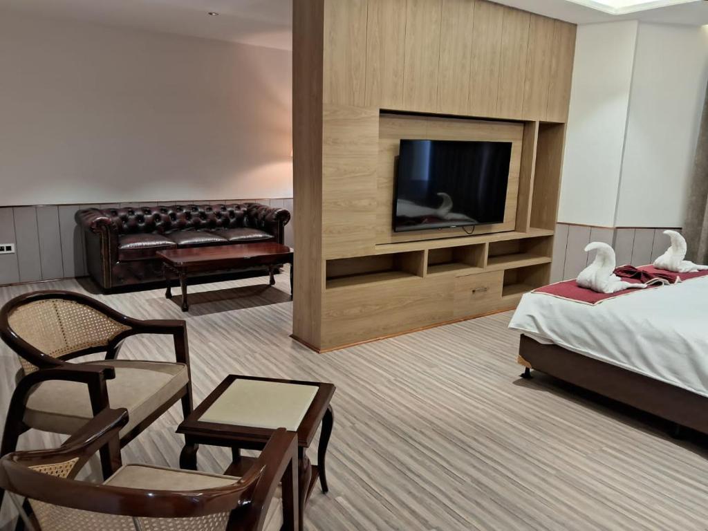 Postel nebo postele na pokoji v ubytování Hotel k11