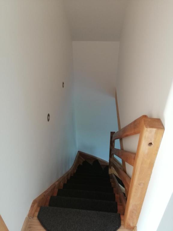 Łóżko lub łóżka w pokoju w obiekcie Domki Alex I Maciek