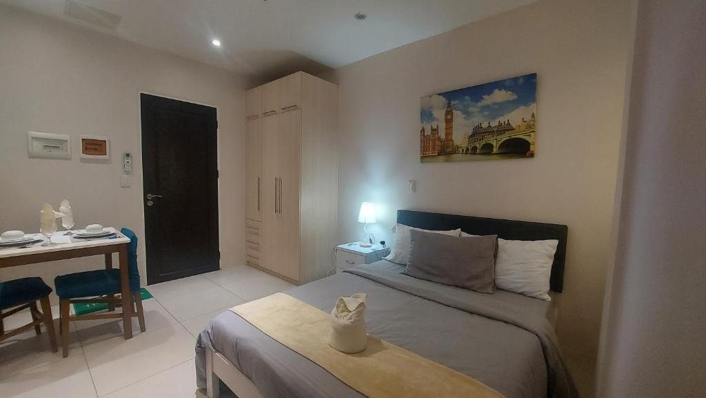 Postel nebo postele na pokoji v ubytování Studio type staycation Matina Enclaves condo fully furnished