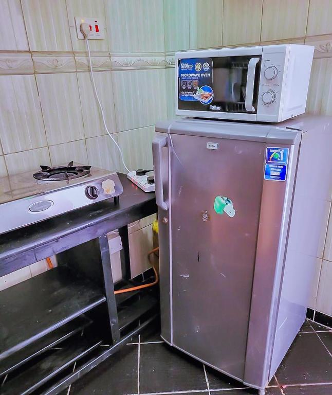 Kuchyň nebo kuchyňský kout v ubytování Dasha Studio apartment Bamburi D4