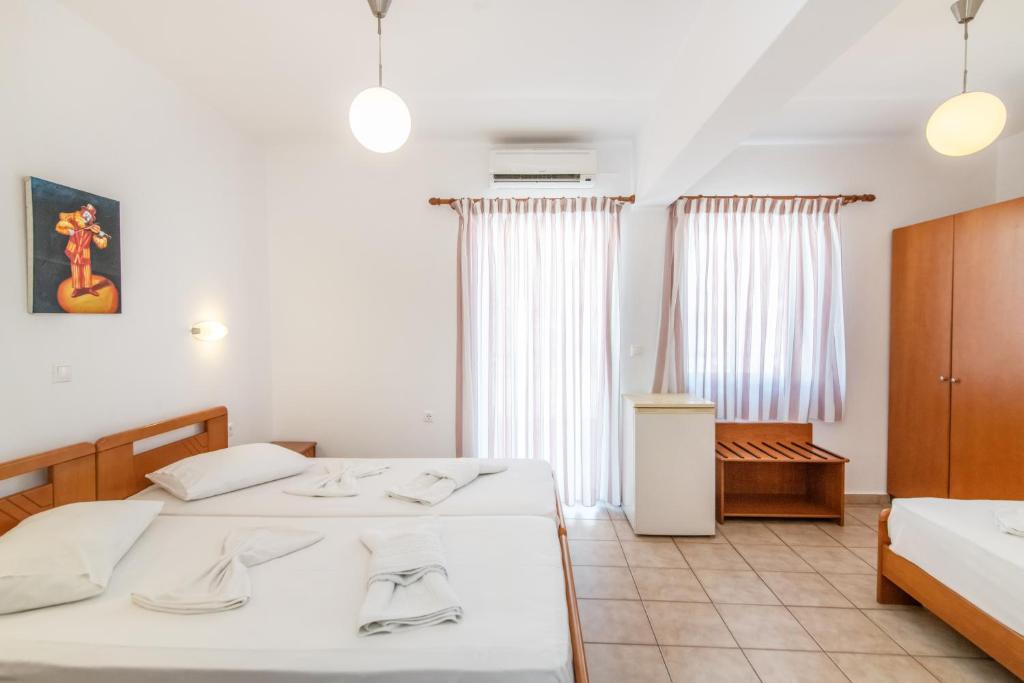 Postel nebo postele na pokoji v ubytování Ageri Hotel