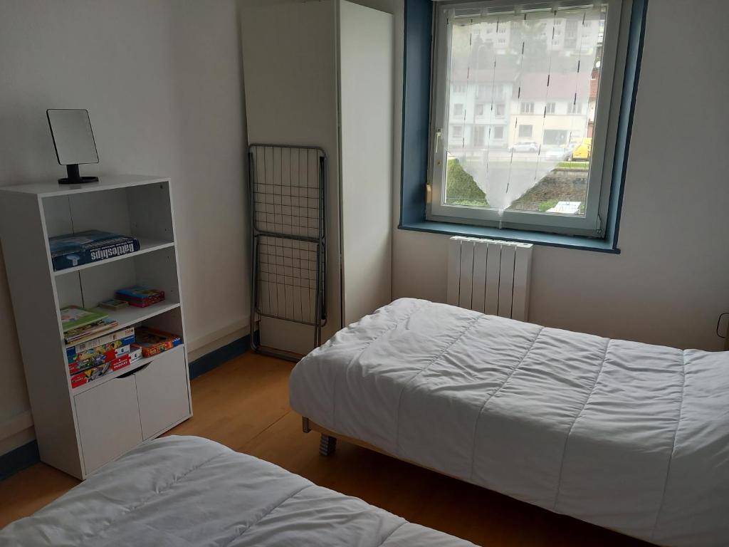 Posteľ alebo postele v izbe v ubytovaní Appartement 4 personnes La Bresse centre