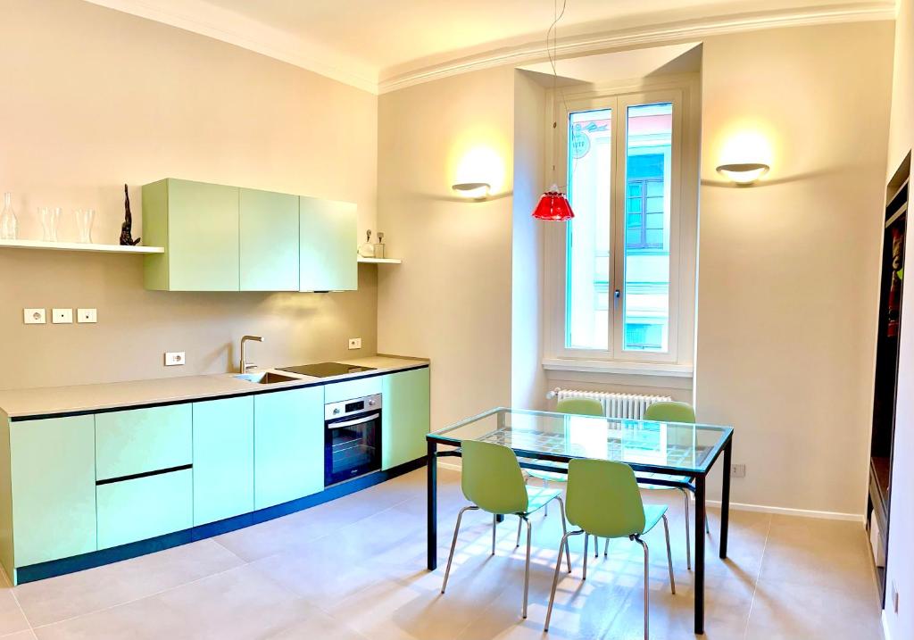 Virtuvė arba virtuvėlė apgyvendinimo įstaigoje Apartment Solferino 37