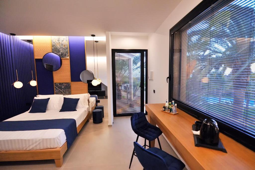 Posteľ alebo postele v izbe v ubytovaní Emesh Boutique Suite