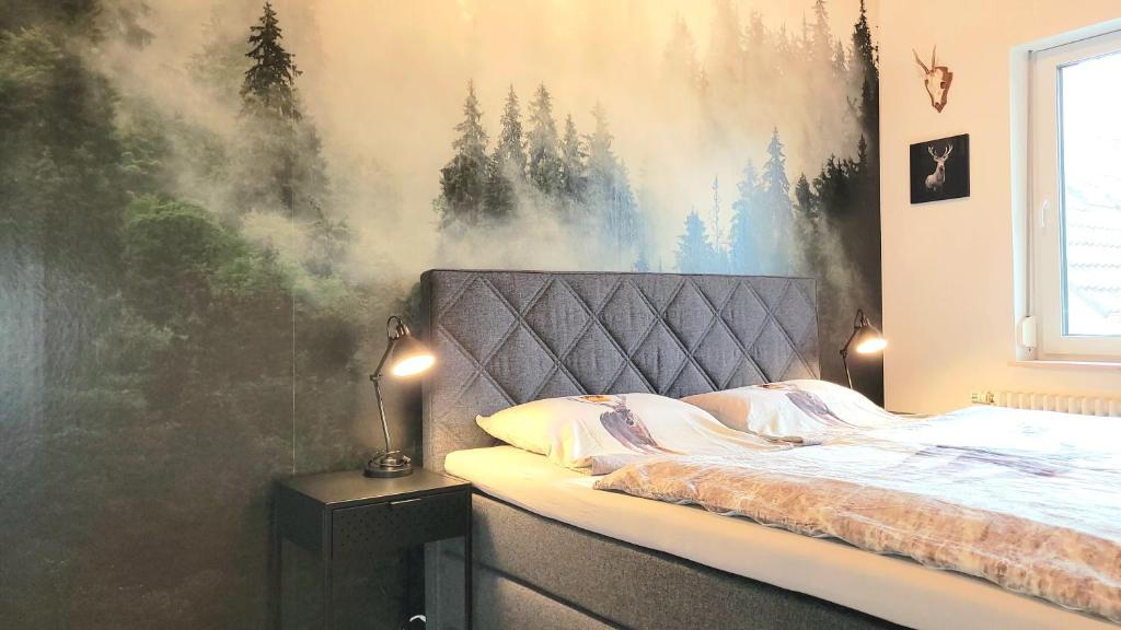 Postel nebo postele na pokoji v ubytování Schwarzwaldliebe Neuried 20 Min zum Europa Park