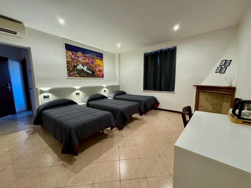 Ένα ή περισσότερα κρεβάτια σε δωμάτιο στο Hotel Duca di Tromello