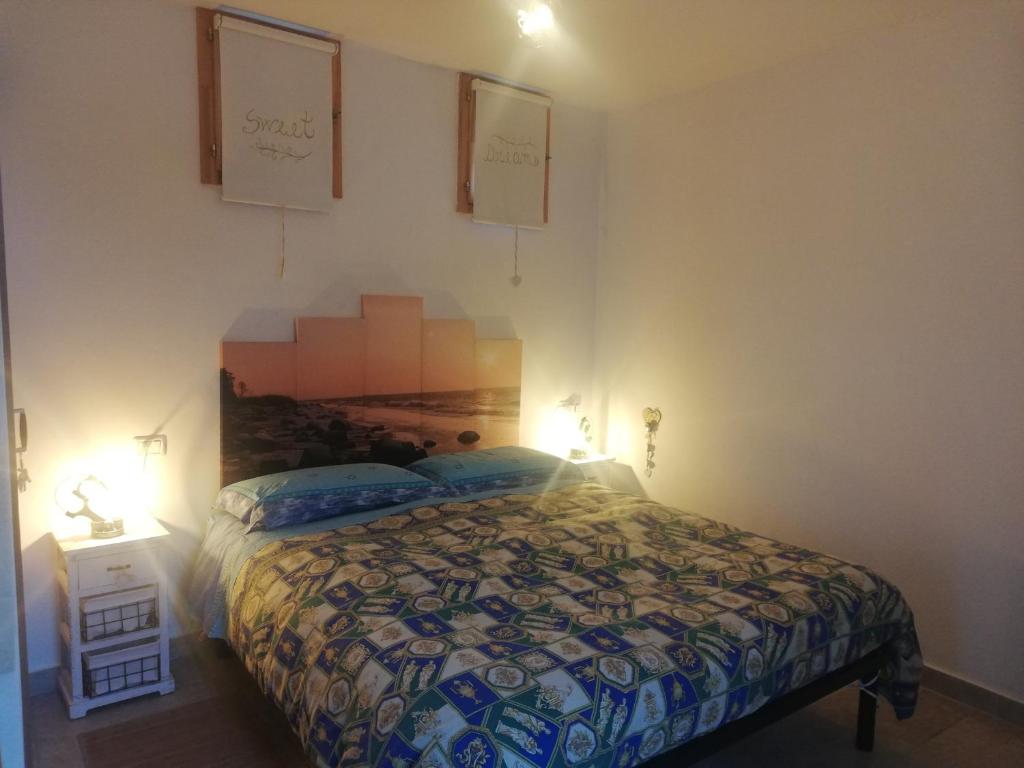 Posteľ alebo postele v izbe v ubytovaní Ciao b&b