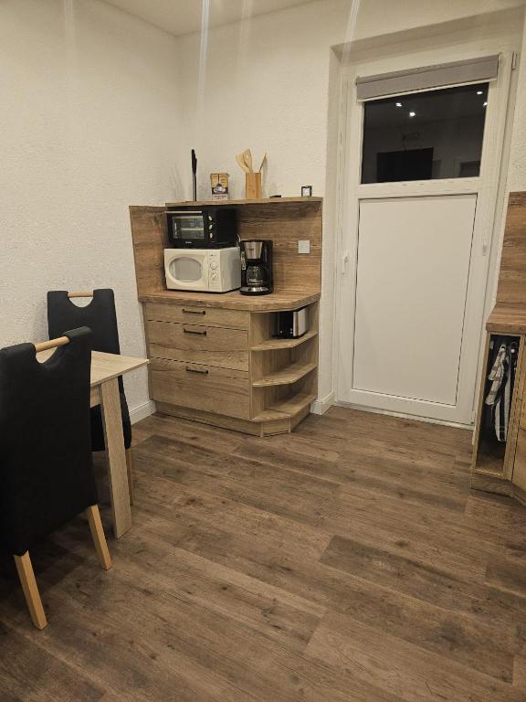 Kuchyň nebo kuchyňský kout v ubytování Ferienwohnung Grimma