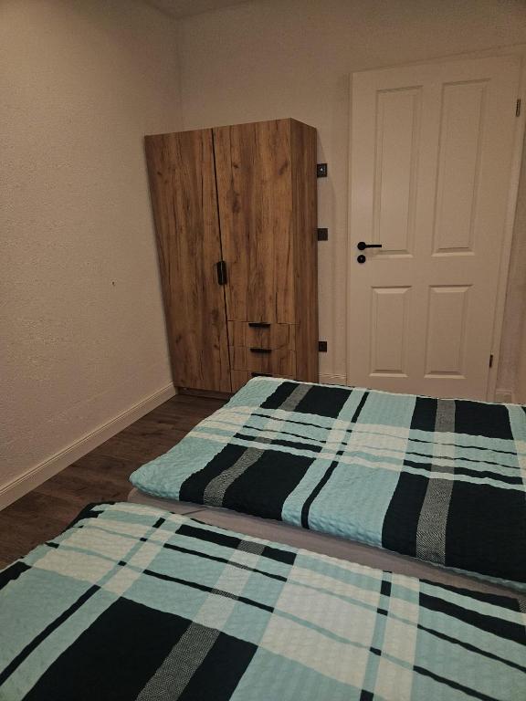 Postel nebo postele na pokoji v ubytování Ferienwohnung Grimma