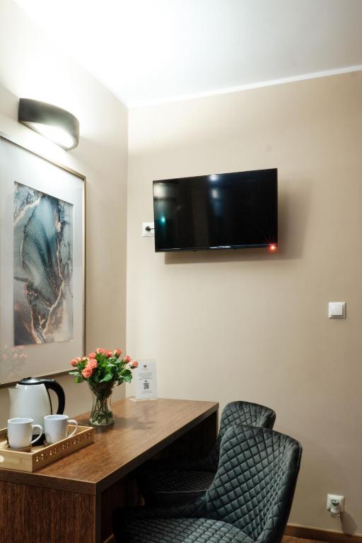 Telewizja i/lub zestaw kina domowego w obiekcie Restauracja Perła