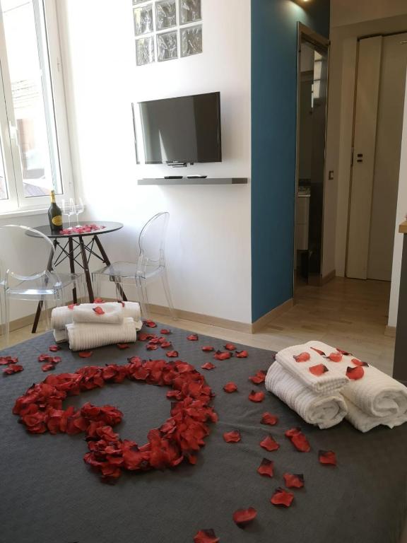 Televízia a/alebo spoločenská miestnosť v ubytovaní JEF Apartments Fontana di Trevi Loft, Roma