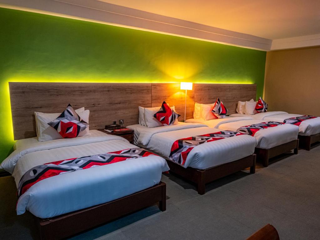 Postel nebo postele na pokoji v ubytování Kojo Hotels Cebu-Mandaue