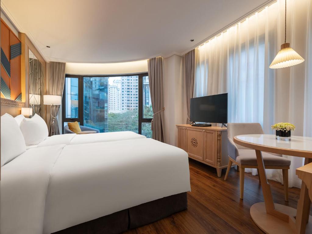 TV a/nebo společenská místnost v ubytování Saigon Aroma Hotel