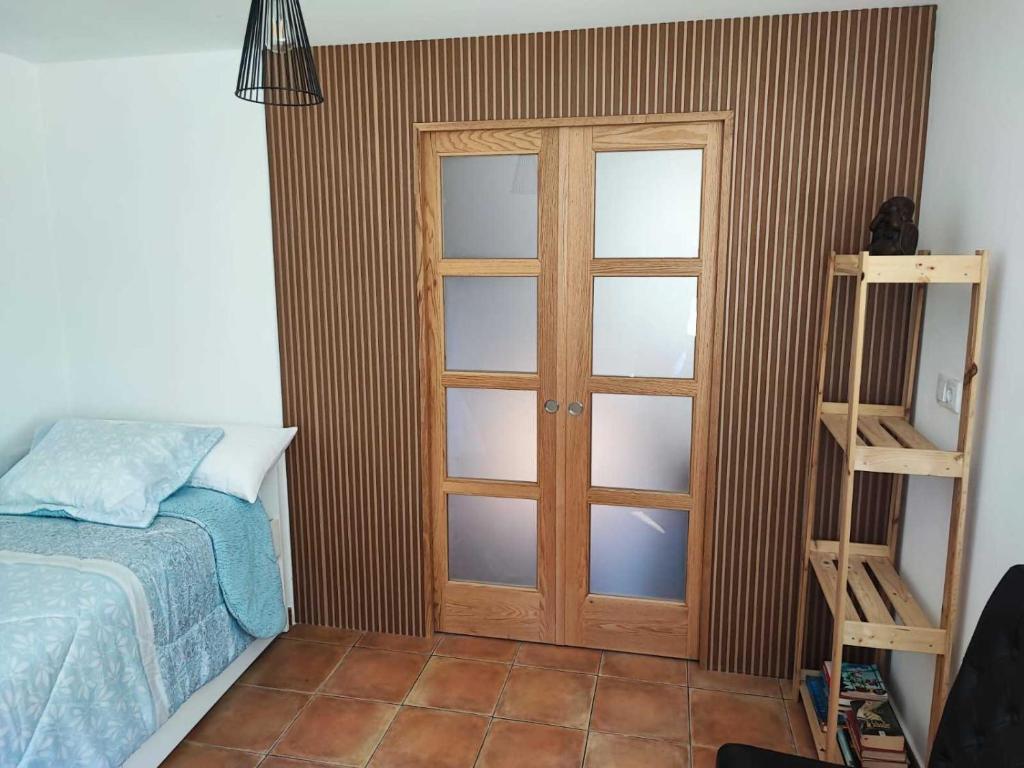 Posteľ alebo postele v izbe v ubytovaní Casa Machina casa con amplia terraza y barbacoa