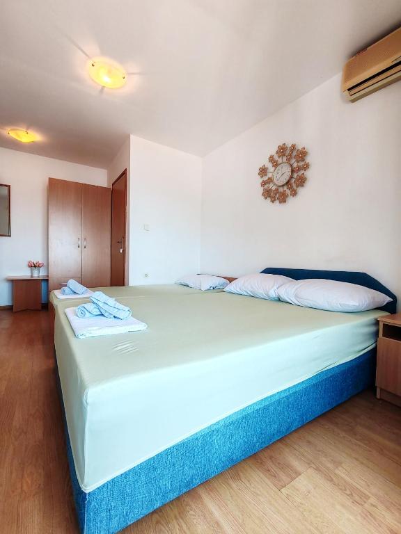 Postel nebo postele na pokoji v ubytování Apartment & Rooms Tempera