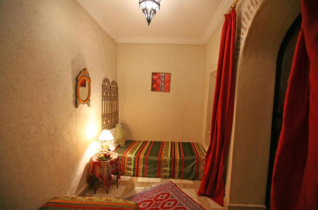 Postel nebo postele na pokoji v ubytování Riad N10