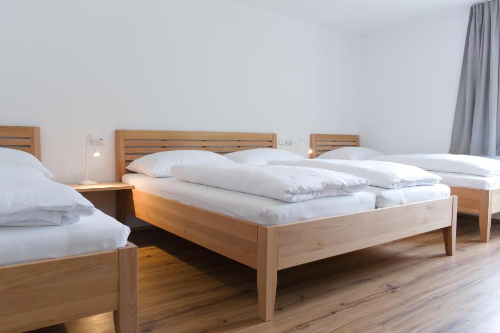 Postel nebo postele na pokoji v ubytování B31 - Ferienwohnung in Bezau