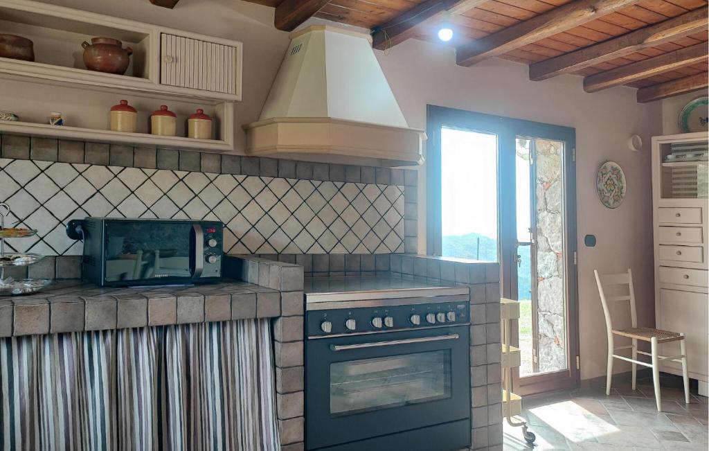 Kuchyň nebo kuchyňský kout v ubytování Villa Aura