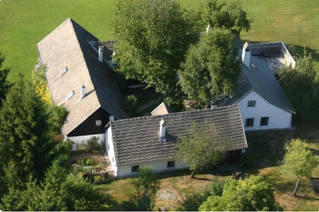 an overhead view of a large white house at Forsthartl 7 Landhausurlaub in Steinbach