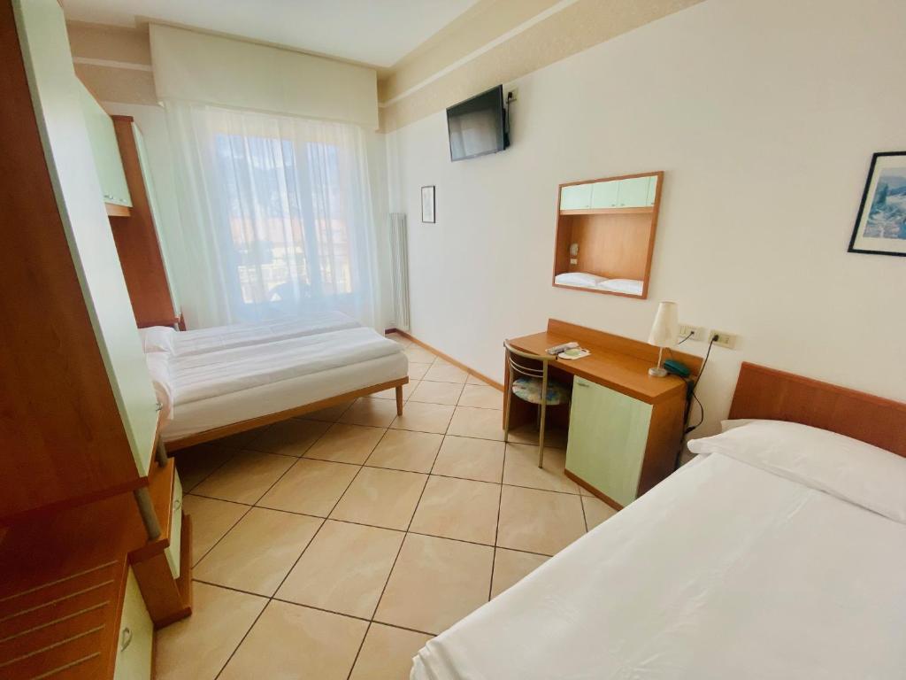 Postel nebo postele na pokoji v ubytování Hotel Ideal