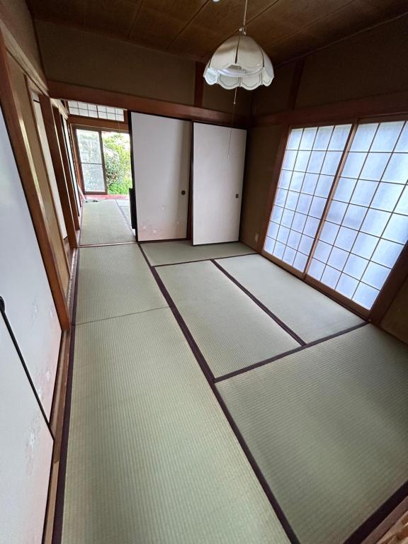 Postel nebo postele na pokoji v ubytování 高島市一棟貸切貸別荘グループファミリーok大人数でご利用だとお得連泊がお得