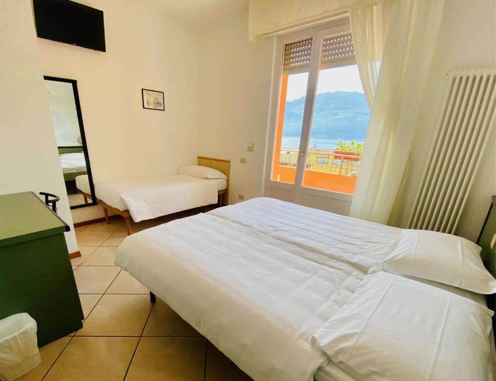 Postel nebo postele na pokoji v ubytování Hotel Ideal