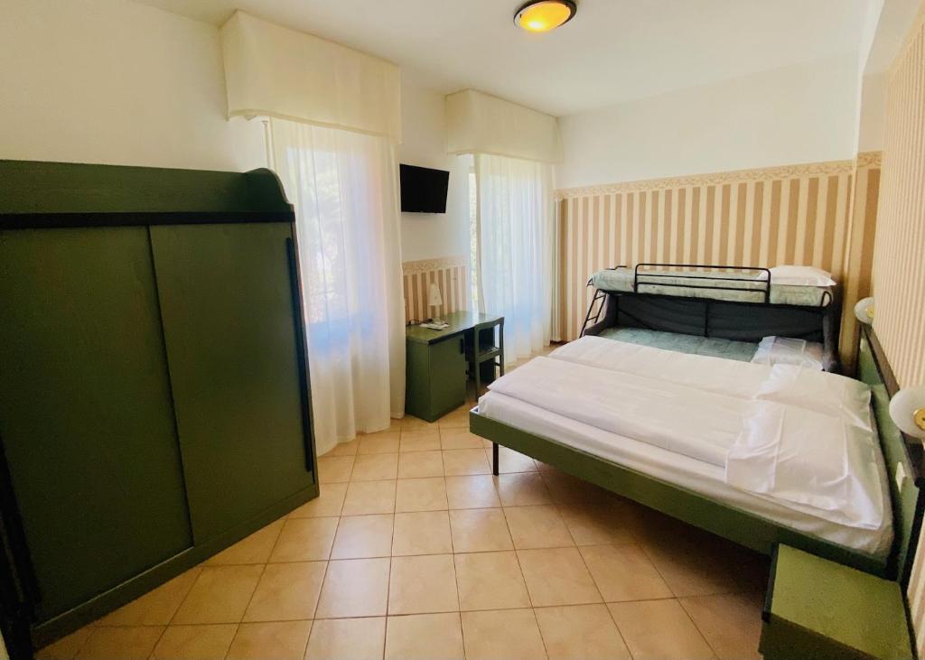 Postel nebo postele na pokoji v ubytování Hotel Ideal