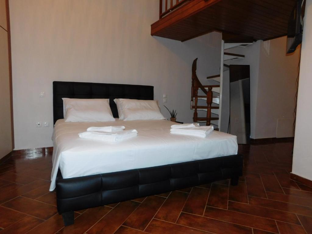 Postel nebo postele na pokoji v ubytování Demi's House