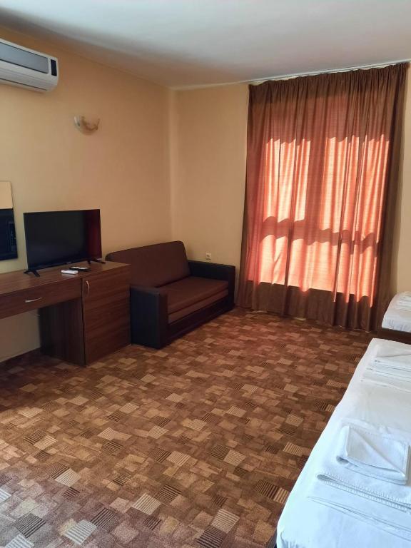 Postel nebo postele na pokoji v ubytování Hotel Sapphire