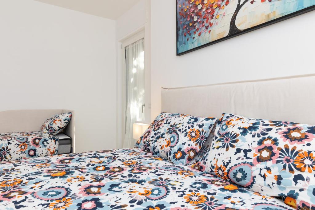 Postel nebo postele na pokoji v ubytování Villa Harmony Sorrento
