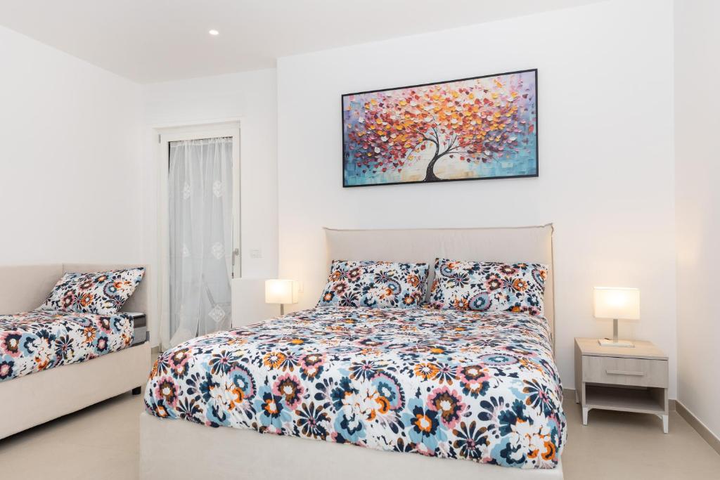 Postel nebo postele na pokoji v ubytování Villa Harmony Sorrento