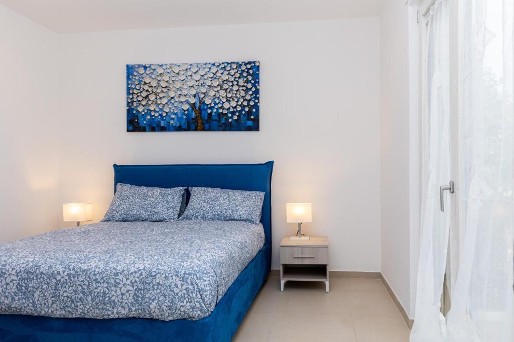 Postel nebo postele na pokoji v ubytování Villa Harmony Sorrento