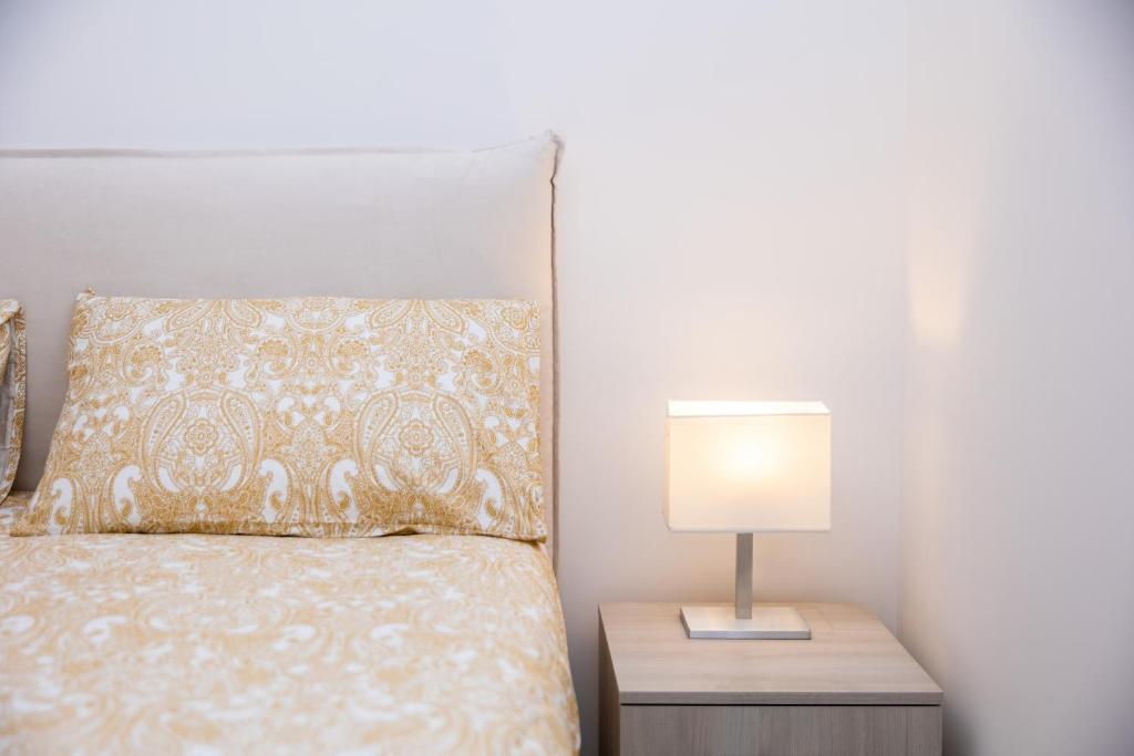 Postel nebo postele na pokoji v ubytování Villa Harmony Sorrento