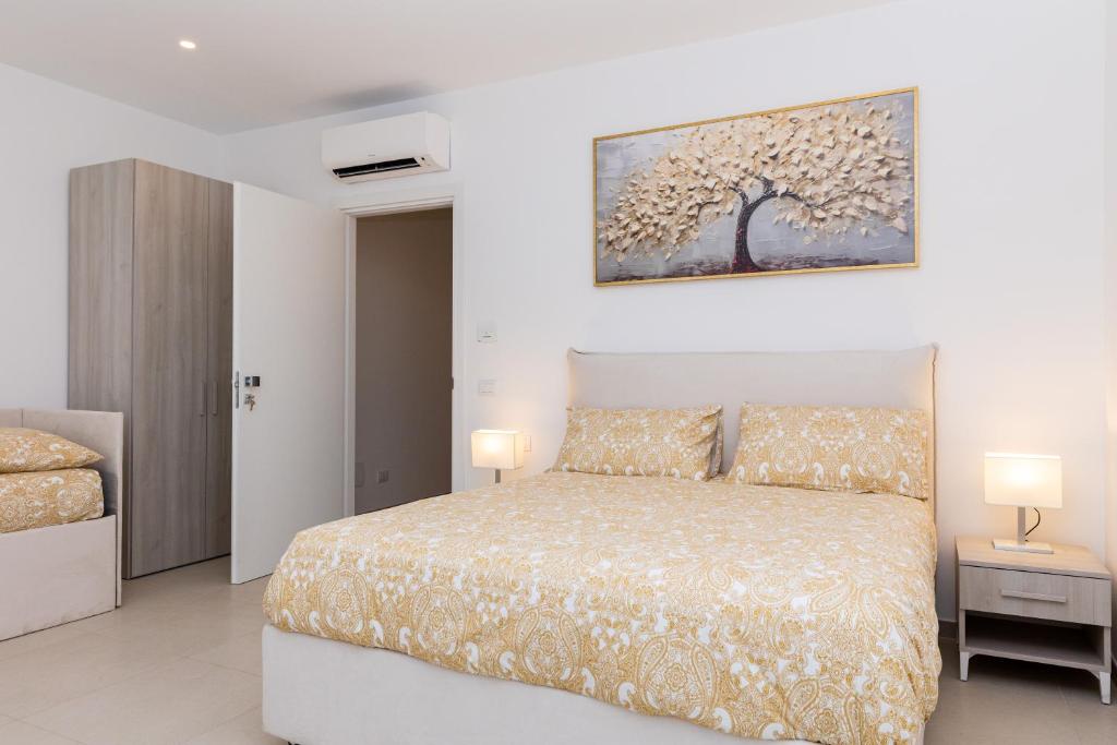 Postel nebo postele na pokoji v ubytování Villa Harmony Sorrento