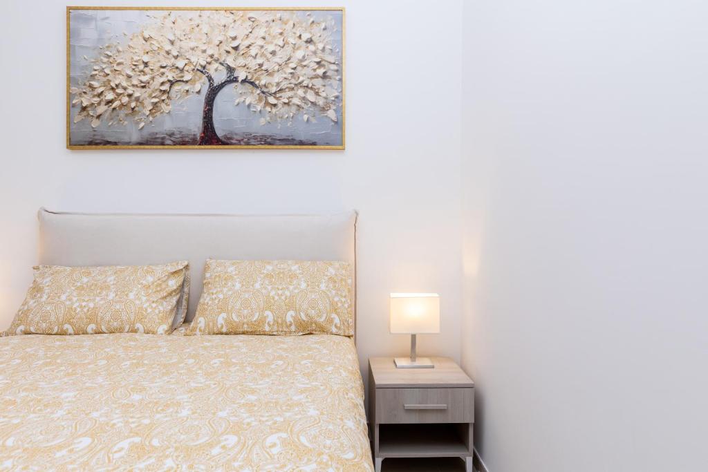 Postel nebo postele na pokoji v ubytování Villa Harmony Sorrento
