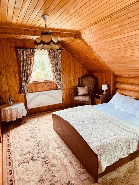 Postel nebo postele na pokoji v ubytování Cottage Kalinka