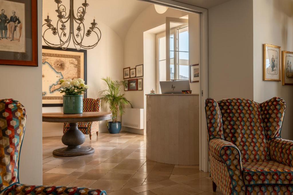 Posezení v ubytování Relais Palazzo del Barone