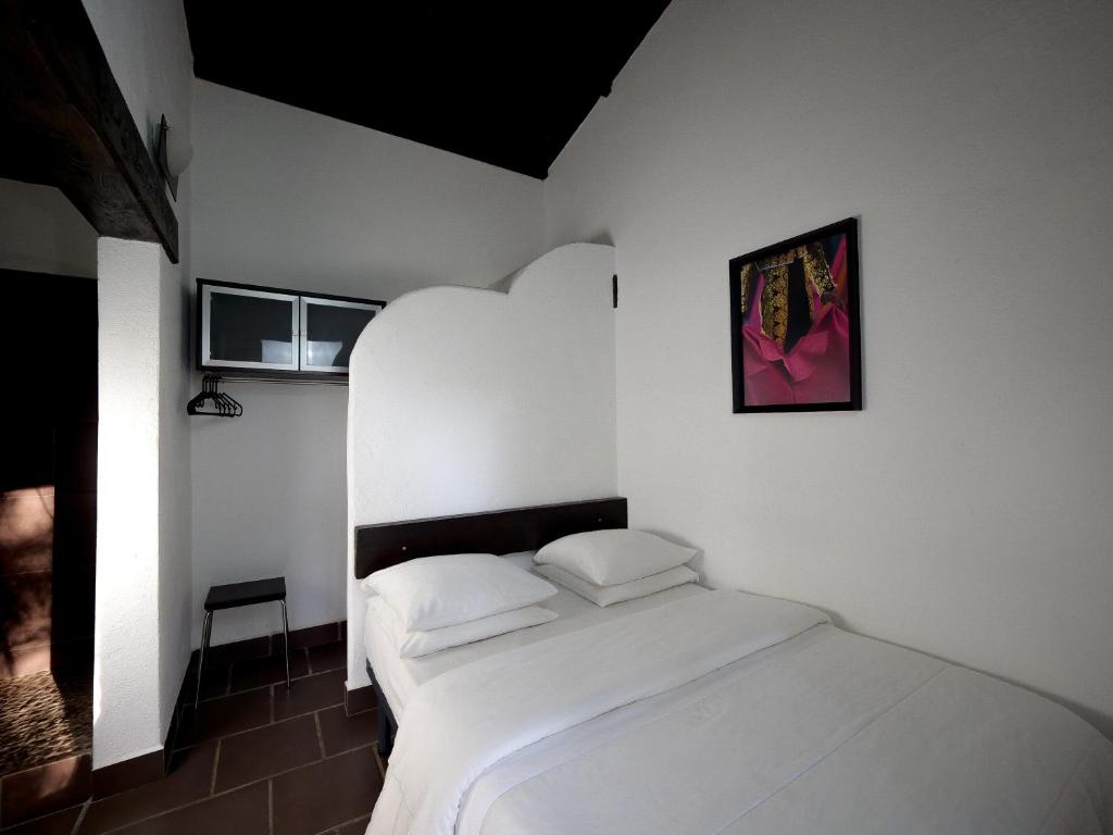 Ein Bett oder Betten in einem Zimmer der Unterkunft MAS MLS