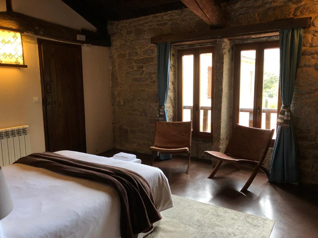Postel nebo postele na pokoji v ubytování Hotel Rural Casal do Mouro