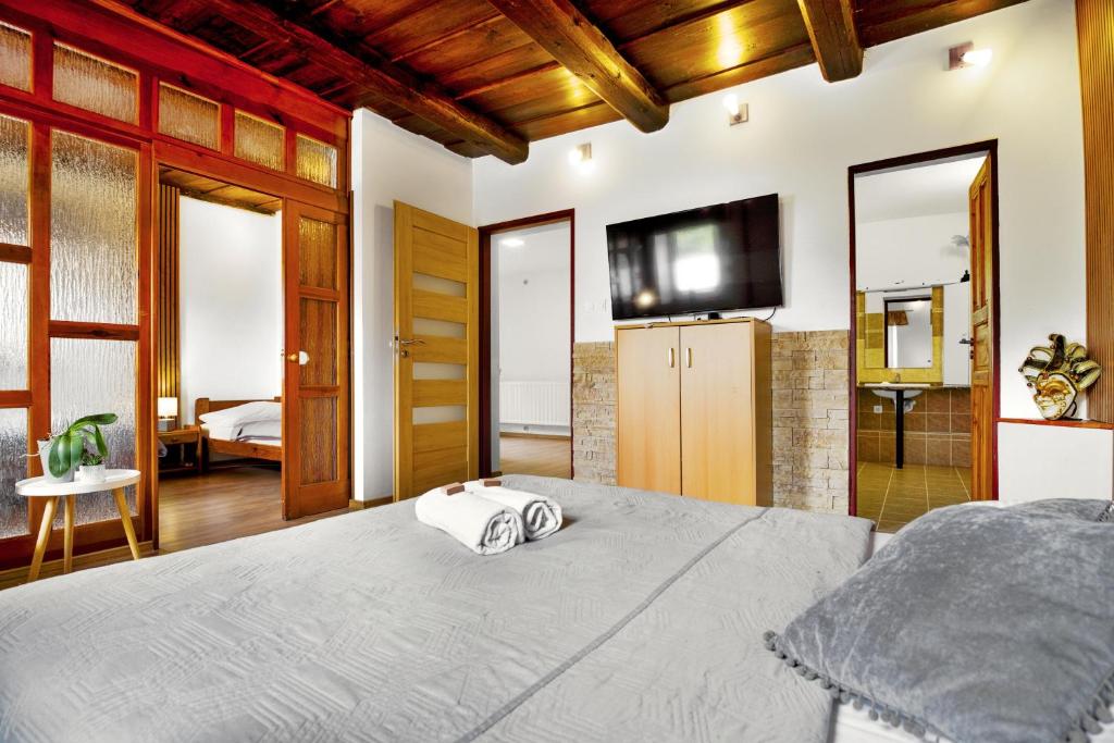 Postel nebo postele na pokoji v ubytování Apartmán Růžák
