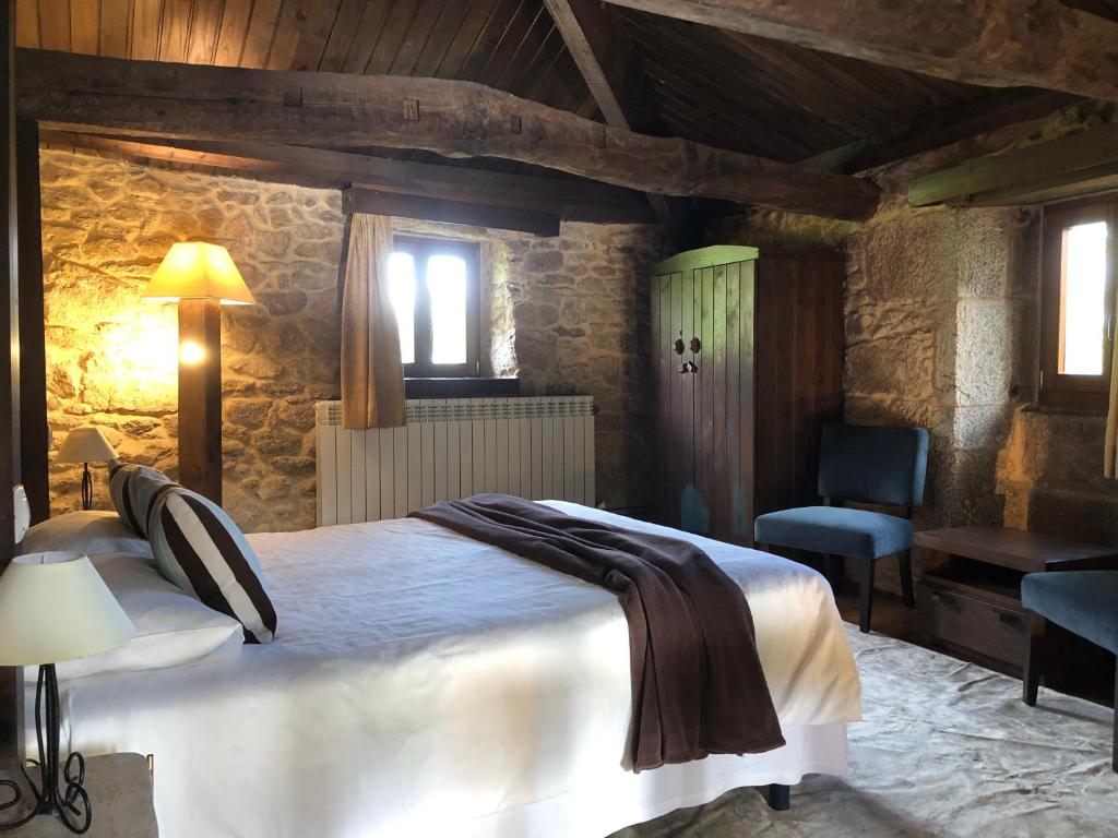 Postel nebo postele na pokoji v ubytování Hotel Rural Casal do Mouro