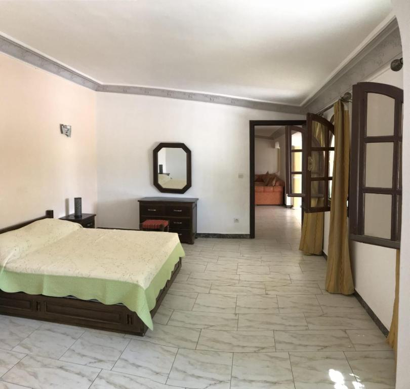 Photo de la galerie de l'établissement Tiguimi Vacances - Oasis Villas, cadre naturel et vue montagne, à Agadir