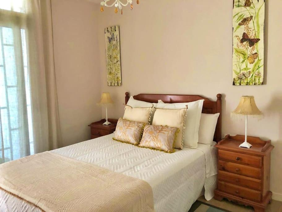 Una cama o camas en una habitación de Oasis de tranquilidad y estilo en Los Cristianos de Membrillo Suites
