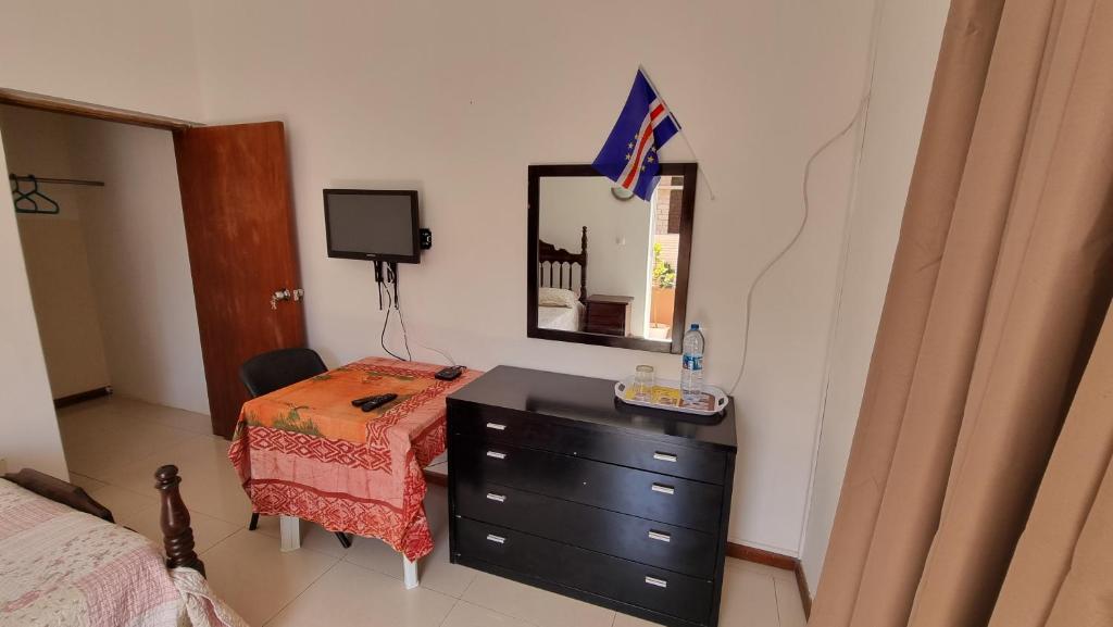 Postel nebo postele na pokoji v ubytování Room in Achada São Filipe, Praia