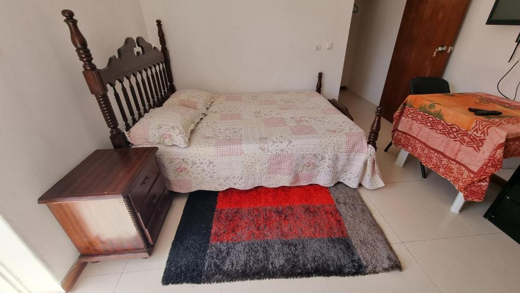 Postel nebo postele na pokoji v ubytování Room in Achada São Filipe, Praia