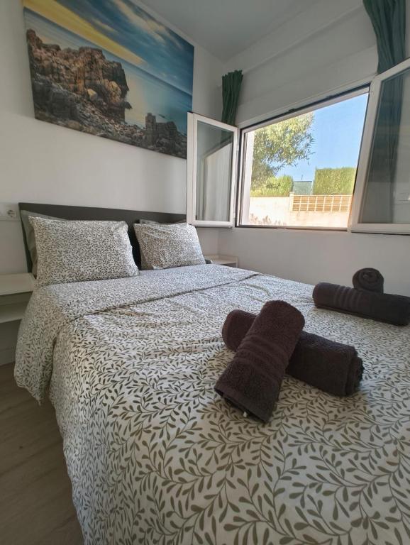 Postel nebo postele na pokoji v ubytování Cozy Studio in Denia