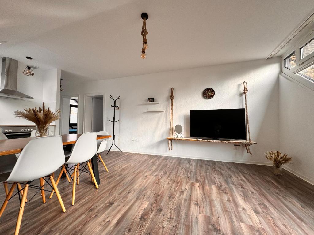 TV a/nebo společenská místnost v ubytování Ferienwohnung in der Heide