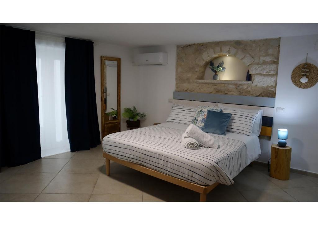Postel nebo postele na pokoji v ubytování CASA COTA